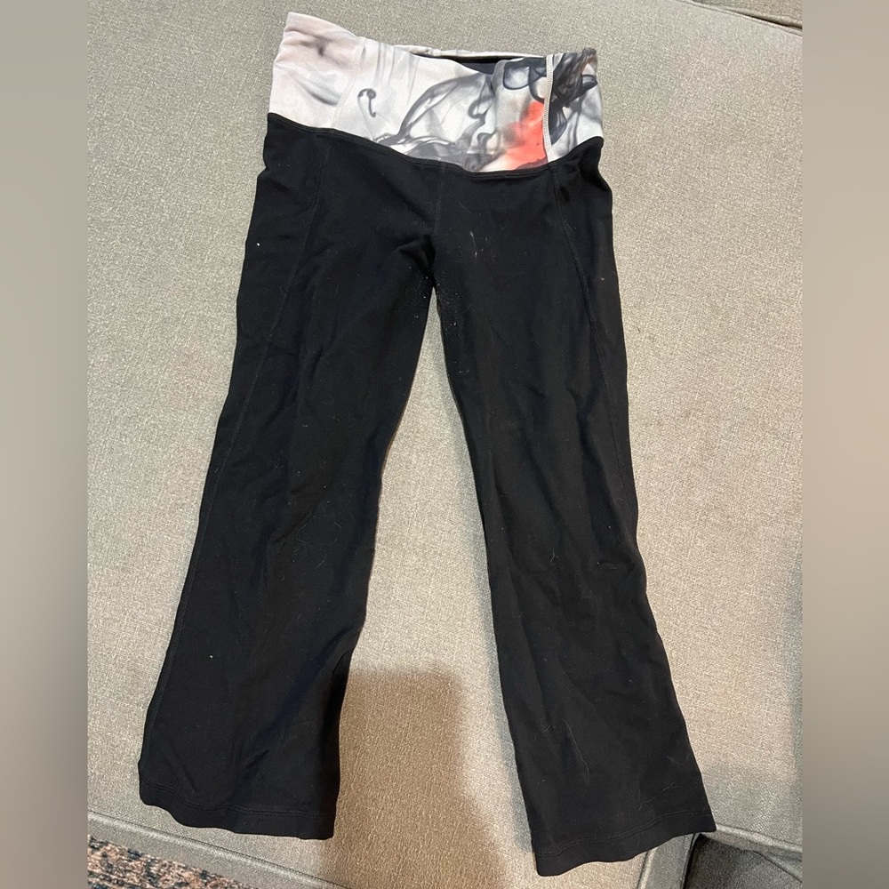Lululemon cropped leggings with slit on back of calf.